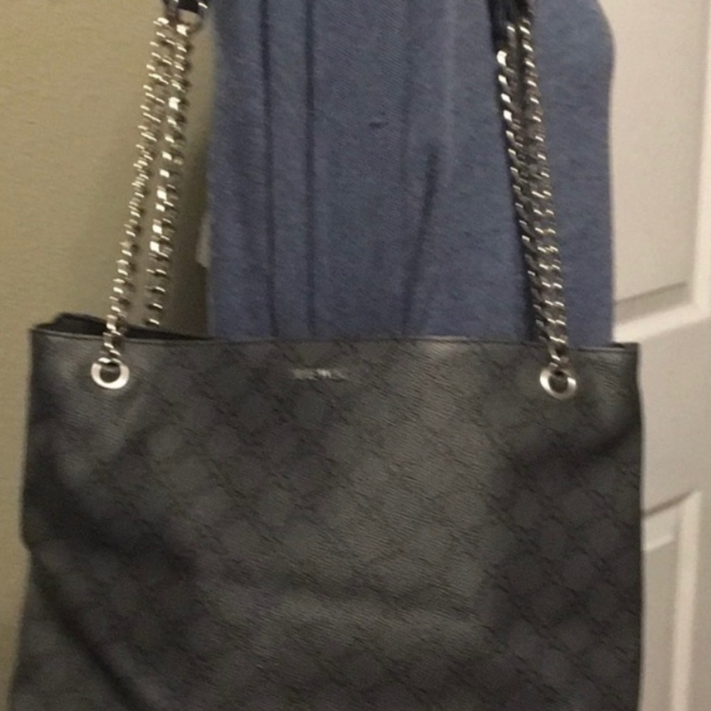 Nine West black with design, silver chain, silver Nine West logo purse.